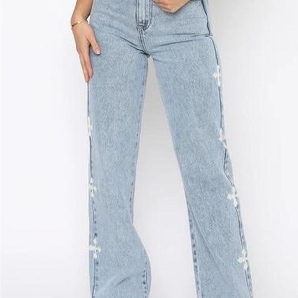 White Fox Boutique Light Blue Flare Jeans with White Cross Accents. Never Worn